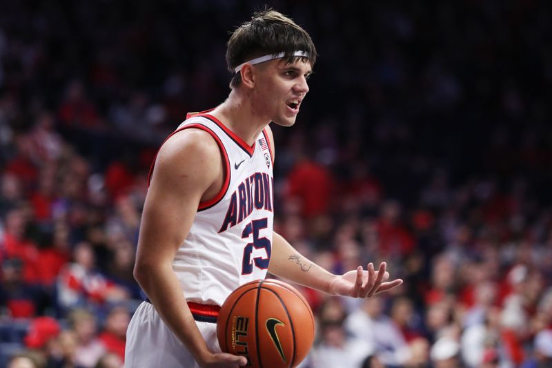 Jan 5, 2023; Tucson, Arizona, USA; Arizona Wildcats guard Kerr Kriisa (25) speaks with the referee in the first half at McKale Center. Mandatory Credit: Zachary BonDurant-USA TODAY Sports