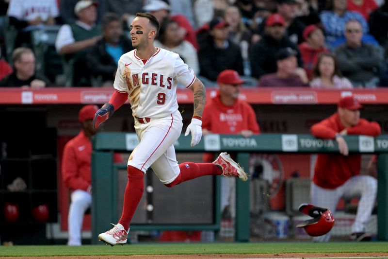 May 13, 2024; Anaheim, California, USA; Los Angeles Angels shortstop Zach Neto (9) runs home to score on a double by second baseman Kyren Paris (19) in the third inning against the St. Louis Cardinals at Angel Stadium. Mandatory Credit: Jayne Kamin-Oncea-USA TODAY Sports