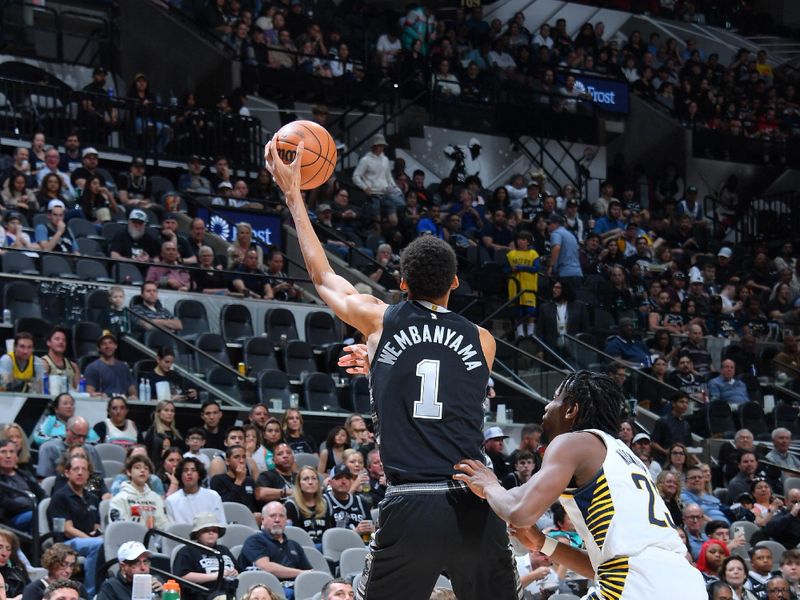 SAN ANTONIO, TX - MARCH 3: Victor Wembanyama #1 of the San Antonio Spurs handles the ball during the game against the Indiana Pacers on March 3, 2024 at the Frost Bank Center in San Antonio, Texas. NOTE TO USER: User expressly acknowledges and agrees that, by downloading and or using this photograph, user is consenting to the terms and conditions of the Getty Images License Agreement. Mandatory Copyright Notice: Copyright 2024 NBAE (Photos by Michael Gonzales/NBAE via Getty Images)