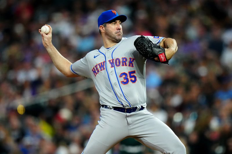 May 27, 2023; Denver, Colorado, USA; New York Mets starting pitcher Justin Verlander (35) delivers against the Colorado Rockies in the sixth inning at Coors Field. Mandatory Credit: Ron Chenoy-USA TODAY Sports