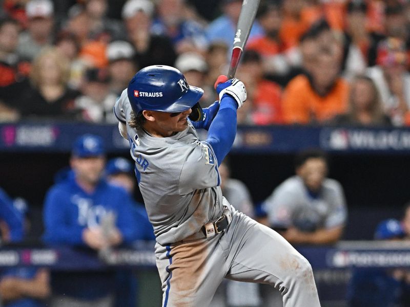 Oct 2, 2024; Baltimore, Maryland, USA; Kansas City Royals shortstop Bobby Witt Jr. (7) hits a RBI single against the Baltimore Orioles in the sixth inning in game two of the Wild Card round for the 2024 MLB Playoffs at Oriole Park at Camden Yards. Mandatory Credit: Tommy Gilligan-Imagn Images