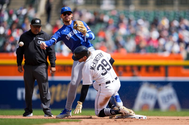 Apr 20, 2025; Detroit, Michigan, USA; Detroit Tigers outfielder Zach McKinstry (39) is forced out at second base by Kansas City Royals shortstop Bobby Witt Jr. (7) in the fifth inning at Comerica Park. Mandatory Credit: Aaron Doster-Imagn Images