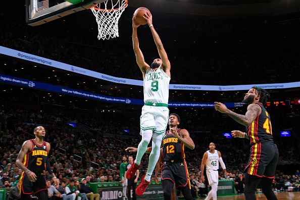 BOSTON, MA - November 26: Derrick White #9 of the Boston Celtics dunks the ball during the game against the Atlanta Hawks on November 26, 2023 at the TD Garden in Boston, Massachusetts. NOTE TO USER: User expressly acknowledges and agrees that, by downloading and or using this photograph, User is consenting to the terms and conditions of the Getty Images License Agreement. Mandatory Copyright Notice: Copyright 2023 NBAE  (Photo by Brian Babineau/NBAE via Getty Images)