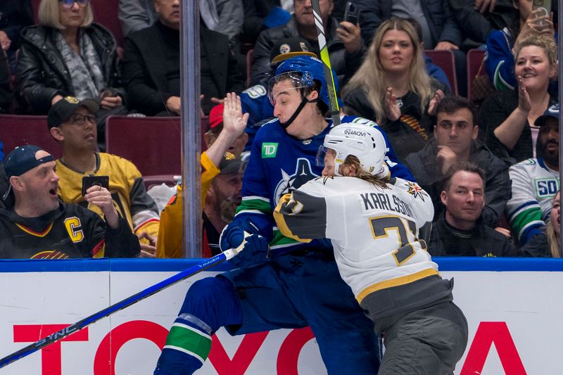 Apr 8, 2024; Vancouver, British Columbia, CAN; Vegas Golden Knights forward William Karlsson (71) checks Vancouver Canucks forward Nils Aman (88) in the third period at Rogers Arena. Canucks won 4 -3. Mandatory Credit: Bob Frid-USA TODAY Sports