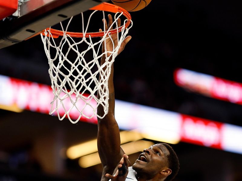 MINNEAPOLIS, MINNESOTA - MARCH 22: Anthony Edwards #5 of the Minnesota Timberwolves goes up for a shot against the Cleveland Cavaliers in the first quarter at Target Center on March 22, 2024 in Minneapolis, Minnesota. NOTE TO USER: User expressly acknowledges and agrees that, by downloading and or using this photograph, User is consenting to the terms and conditions of the Getty Images License Agreement. (Photo by David Berding/Getty Images)