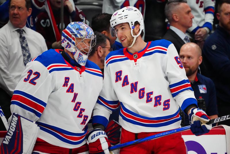 Jan 14, 2025; Denver, Colorado, USA; New York Rangers goaltender Jonathan Quick (32) and left wing Will Cuylle (50) before the game against the against the Colorado Avalanche at Ball Arena. Mandatory Credit: Ron Chenoy-Imagn Images