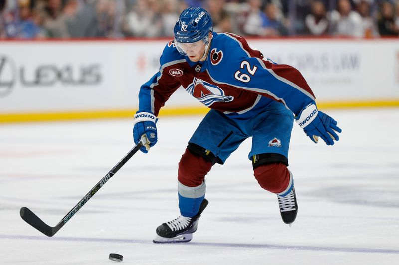 Dec 11, 2025; Denver, Colorado, USA; Colorado Avalanche left wing Artturi Lehkonen (62) controls the puck on a breakaway in the second period against the Florida Panthers at Ball Arena. Mandatory Credit: Isaiah J. Downing-Imagn Images