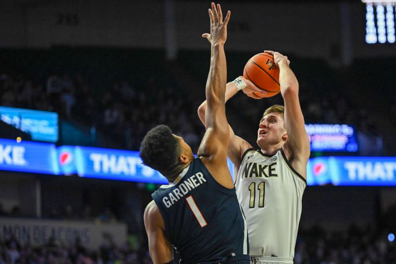 Jan 21, 2023; Winston-Salem, North Carolina, USA; Wake Forest Demon Deacons forward Andrew Carr (11) shoots over Virginia Cavaliers forward Jayden Gardner (1) during the first half at Lawrence Joel Veterans Memorial Coliseum. Mandatory Credit: William Howard-USA TODAY Sports