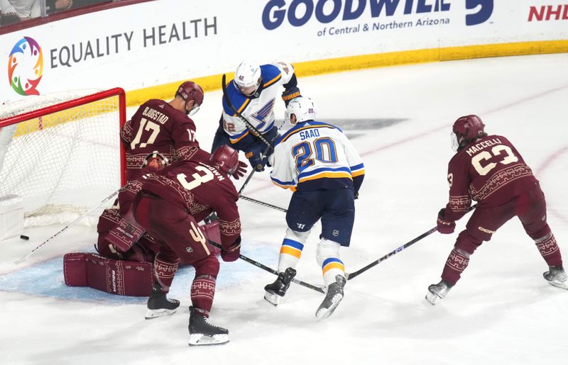 Dec 2, 2023; Tempe, Arizona, USA; St. Louis Blues left wing Brandon Saad (20) scores against the Arizona Coyotes during the third period at Mullett Arena. Mandatory Credit: Joe Camporeale-USA TODAY Sports