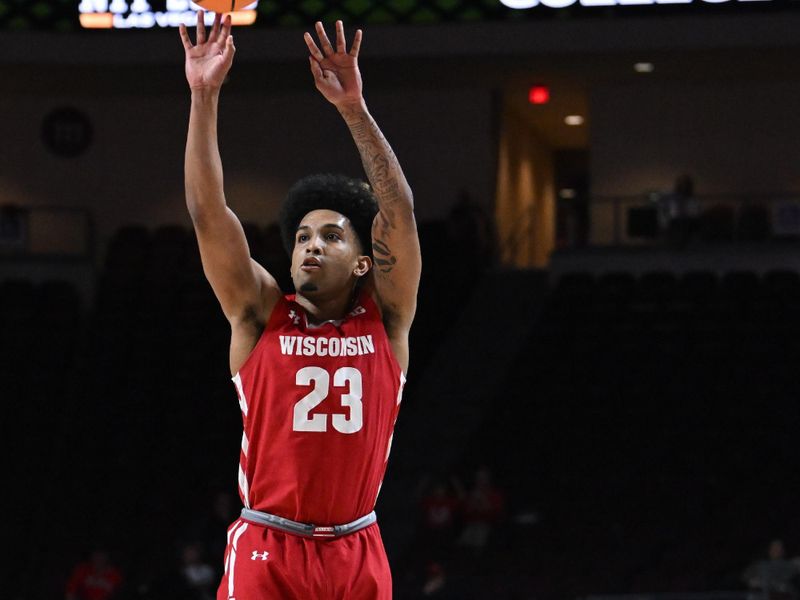 Mar 28, 2023; Las Vegas, NV, USA; Wisconsin Badgers guard Chucky Hepburn (23) shoots the ball against the North Texas Mean Green in the first half at Orleans Arena. Mandatory Credit: Candice Ward-USA TODAY Sports