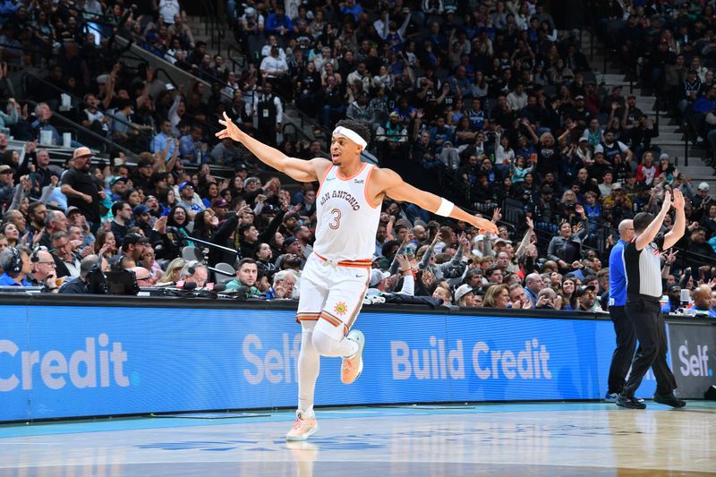 SAN ANTONIO, TX - MARCH 19: Keldon Johnson #3 of the San Antonio Spurs celebrates a three point basket during the game against the Dallas Mavericks on March 19, 2024 at the Frost Bank Center in San Antonio, Texas. NOTE TO USER: User expressly acknowledges and agrees that, by downloading and or using this photograph, user is consenting to the terms and conditions of the Getty Images License Agreement. Mandatory Copyright Notice: Copyright 2024 NBAE (Photos by Michael Gonzales/NBAE via Getty Images)