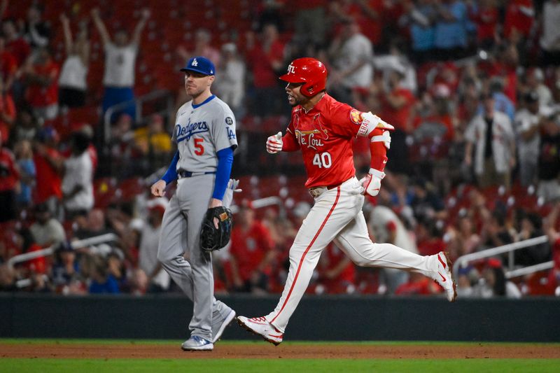 Jun 6, 2025; St. Louis, Missouri, USA;  St. Louis Cardinals first baseman Willson Contreras (40) reacts as he runs the bases after hitting a solo home run against the Los Angeles Dodgers during the eighth inning at Busch Stadium. Mandatory Credit: Jeff Curry-Imagn Images
