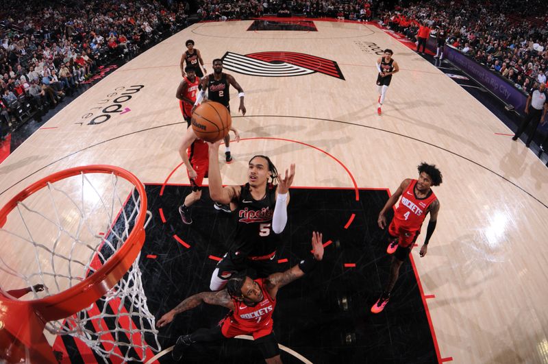 PORTLAND, OR - APRIL 12: Dalano Banton #5 of the Portland Trail Blazers shoots the ball during the game against the Houston Rockets on April 12, 2024 at the Moda Center Arena in Portland, Oregon. NOTE TO USER: User expressly acknowledges and agrees that, by downloading and or using this photograph, user is consenting to the terms and conditions of the Getty Images License Agreement. Mandatory Copyright Notice: Copyright 2024 NBAE (Photo by Cameron Browne/NBAE via Getty Images)