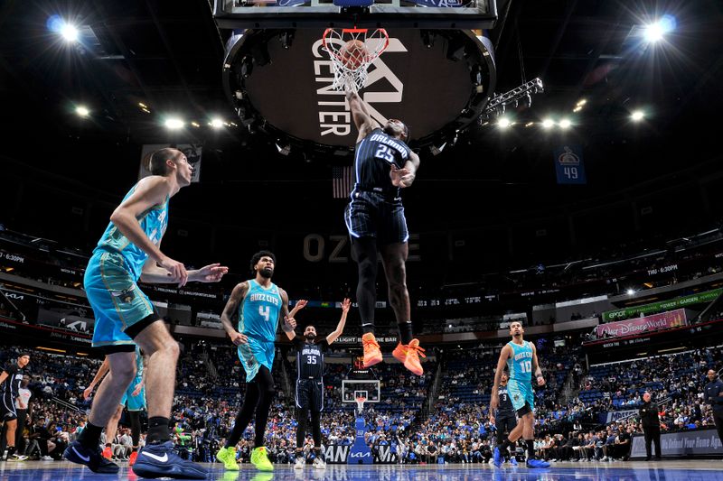 ORLANDO, FL - MARCH 19: Admiral Schofield #25 of the Orlando Magic dunks the ball during the game against the Charlotte Hornets on March 19, 2024 at the Kia Center in Orlando, Florida. NOTE TO USER: User expressly acknowledges and agrees that, by downloading and or using this photograph, User is consenting to the terms and conditions of the Getty Images License Agreement. Mandatory Copyright Notice: Copyright 2024 NBAE (Photo by Fernando Medina/NBAE via Getty Images)