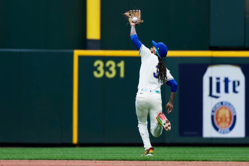 Jul 20, 2025; Seattle, Washington, USA; Seattle Mariners shortstop J.P. Crawford (3) drops a fly ball for an error against the Houston Astros during the fifth inning at T-Mobile Park. Mandatory Credit: Joe Nicholson-Imagn Images
