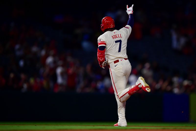 Aug 12, 2024; Anaheim, California, USA; Los Angeles Angels right fielder Jo Adell (7) runs the bases after hitting a solo home run against the Toronto Blue Jays during the ninth inning at Angel Stadium. Mandatory Credit: Gary A. Vasquez-USA TODAY Sports