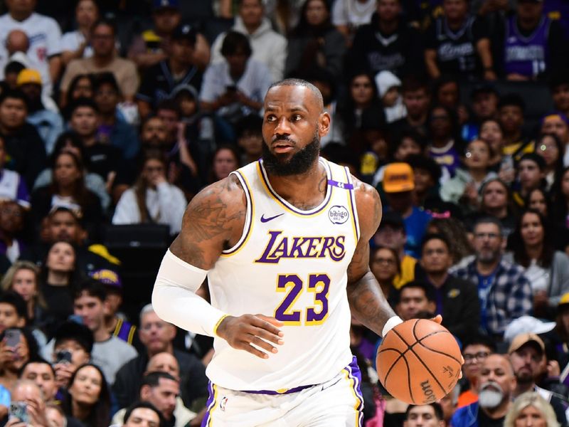 LOS ANGELES, CA - OCTOBER 26: LeBron James #23 of the Los Angeles Lakers dribbles the ball during the game against the Sacramento Kings on October 26, 2024 at Crypto.Com Arena in Los Angeles, California. NOTE TO USER: User expressly acknowledges and agrees that, by downloading and/or using this Photograph, user is consenting to the terms and conditions of the Getty Images License Agreement. Mandatory Copyright Notice: Copyright 2024 NBAE (Photo by Adam Pantozzi/NBAE via Getty Images)