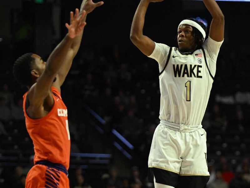 Jan 17, 2023; Winston-Salem, North Carolina, USA; Wake Forest Demon Deacons guard Tyree Appleby (1) shoots the ball over Clemson Tigers guard Chase Hunter (1) during the first half at Lawrence Joel Veterans Memorial Coliseum. Mandatory Credit: William Howard-USA TODAY Sports