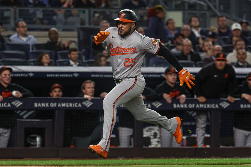 Sep 24, 2024; Bronx, New York, USA;  Baltimore Orioles right fielder Anthony Santander (25) scores a run during the fourth inning against the New York Yankees at Yankee Stadium. Mandatory Credit: Vincent Carchietta-Imagn Images