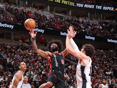 CHICAGO, IL - DECEMBER 21: Coby White #0 of the Chicago Bulls shoots the ball during the game against the San Antonio Spurs on December 21, 2023 at United Center in Chicago, Illinois. NOTE TO USER: User expressly acknowledges and agrees that, by downloading and or using this photograph, User is consenting to the terms and conditions of the Getty Images License Agreement. Mandatory Copyright Notice: Copyright 2023 NBAE (Photo by Jeff Haynes/NBAE via Getty Images)