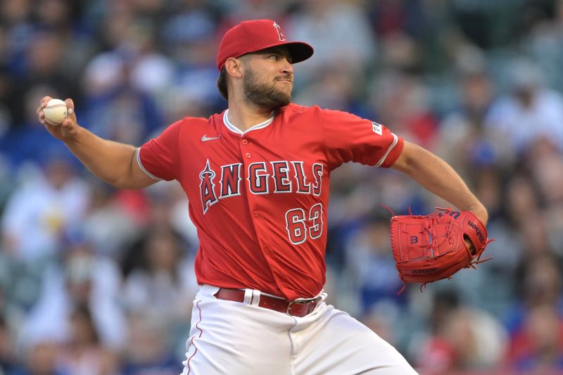 Mar 26, 2024; Anaheim, California, USA;  Los Angeles Angels starting pitcher Chase Silseth (63) throws to the plate in the second inning against the Los Angeles Dodgers at Angel Stadium. Mandatory Credit: Jayne Kamin-Oncea-USA TODAY Sports