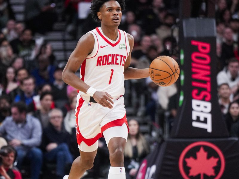 TORONTO, ON - FEBRUARY 9: Amen Thompson #1 of the Houston Rockets dribbles against the Toronto Raptors during the second half of their basketball game at the Scotiabank Arena on February 9, 2024 in Toronto, Ontario, Canada. NOTE TO USER: User expressly acknowledges and agrees that, by downloading and/or using this Photograph, user is consenting to the terms and conditions of the Getty Images License Agreement. (Photo by Mark Blinch/Getty Images)