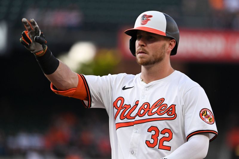 Apr 29, 2024; Baltimore, Maryland, USA; Baltimore Orioles designated hitter Ryan O'Hearn (32) reacts after hitting a single during the first inning against the New York Yankees  at Oriole Park at Camden Yards. Mandatory Credit: Tommy Gilligan-USA TODAY Sports