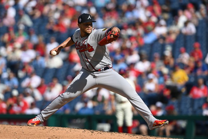 Sep 11, 2023; Philadelphia, Pennsylvania, USA;  Atlanta Braves relief pitcher Joe Jimenez (77) pitches in the seventh inning against the Philadelphia Phillies at Citizens Bank Park. The Braves won 10-8. Mandatory Credit: John Geliebter-USA TODAY Sports