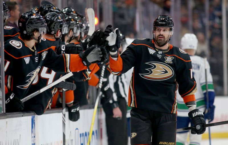 Mar 3, 2024; Anaheim, California, USA; Anaheim Ducks left wing Alex Killorn (17) celebrates with teammates after scoring a goal during the first period against the Vancouver Canucks at Honda Center. Mandatory Credit: Jason Parkhurst-USA TODAY Sports