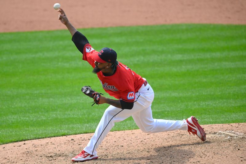 May 5, 2024; Cleveland, Ohio, USA; Cleveland Guardians relief pitcher Emmanuel Clase (48) delivers a pitch in the ninth inning against the Los Angeles Angels at Progressive Field. Mandatory Credit: David Richard-USA TODAY Sports