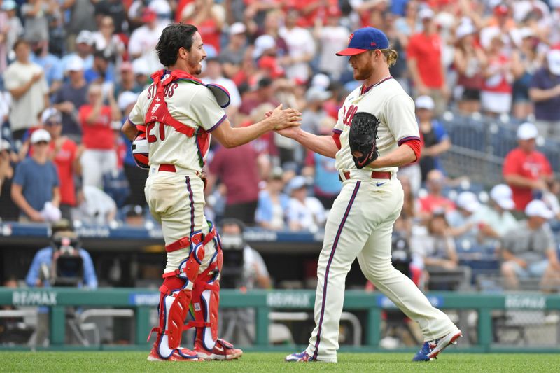 Jun 11, 2023; Philadelphia, Pennsylvania, USA; Philadelphia Phillies catcher Garrett Stubbs (21) and relief pitcher Craig Kimbrel (31) celebrate win against the Los Angeles Dodgers at Citizens Bank Park. Mandatory Credit: Eric Hartline-USA TODAY Sports