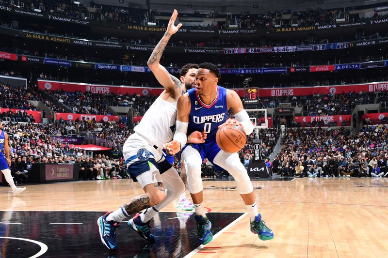 LOS ANGELES, CA - FEBRUARY 28: Russell Westbrook  #0 of the LA Clippers dribbles the ball during the game against the Minnesota Timberwolves on February 28, 2023 at Crypto.Com Arena in Los Angeles, California. NOTE TO USER: User expressly acknowledges and agrees that, by downloading and/or using this Photograph, user is consenting to the terms and conditions of the Getty Images License Agreement. Mandatory Copyright Notice: Copyright 2023 NBAE (Photo by Adam Pantozzi/NBAE via Getty Images)