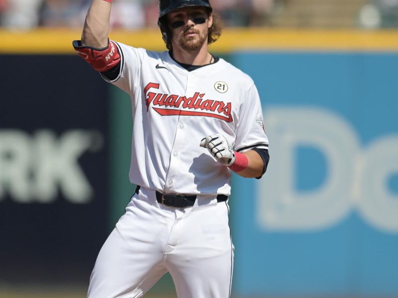 Sep 15, 2024; Cleveland, Ohio, USA; Cleveland Guardians third baseman Daniel Schneemann (10) celebrates after hitting a double during the second inning against the Tampa Bay Rays at Progressive Field. Mandatory Credit: Ken Blaze-Imagn Images