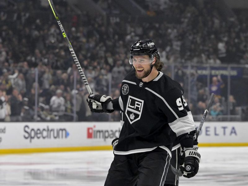 Feb 11, 2023; Los Angeles, California, USA;  Los Angeles Kings right wing Adrian Kempe (9) celebrates after his second goal of the game against the Pittsburgh Penguins at Crypto.com Arena. Mandatory Credit: Jayne Kamin-Oncea-USA TODAY Sports