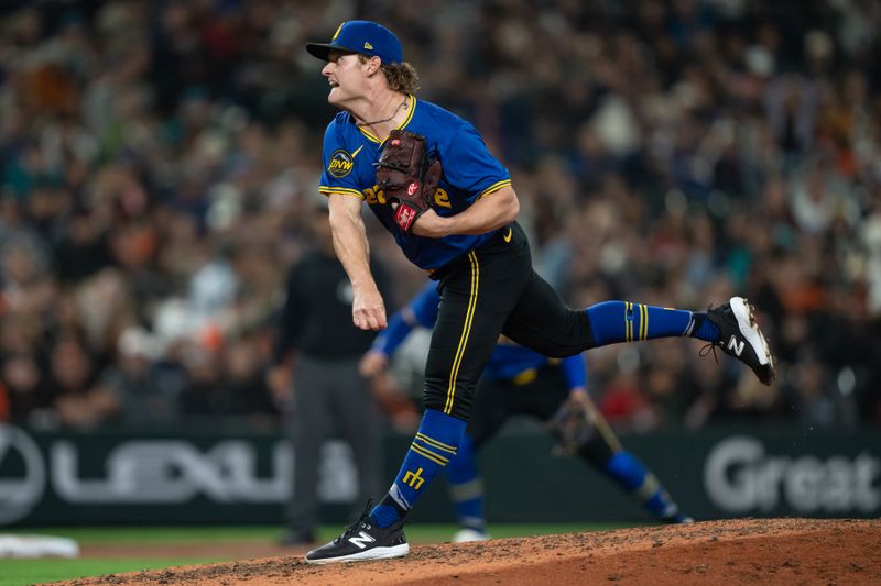 Aug 23, 2024; Seattle, Washington, USA; Seattle Mariners reliever Troy Taylor (59) delivers a pitch during the sixth inning against the San Francisco Giants at T-Mobile Park. Mandatory Credit: Stephen Brashear-USA TODAY Sports