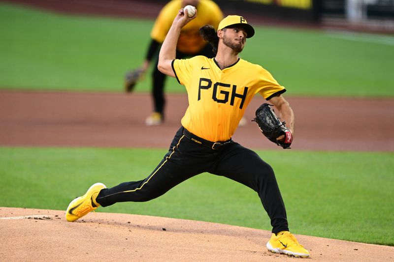 May 10, 2024; Pittsburgh, Pennsylvania, USA; Pittsburgh Pirates starting pitcher Jared Jones (37) throws a pitch in the first inning against the Chicago Cubs at PNC Park. Mandatory Credit: David Dermer-USA TODAY Sports