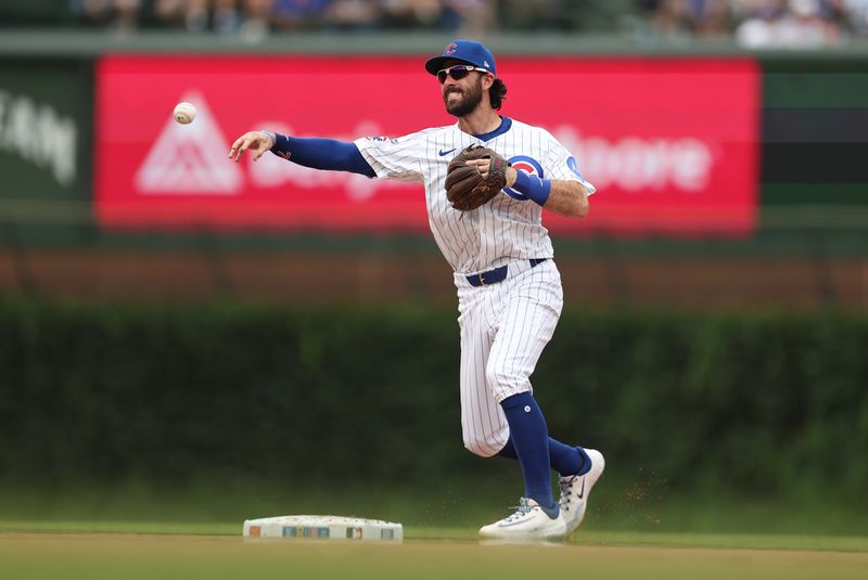 Aug 17, 2025; Chicago, Illinois, USA;  Chicago Cubs shortstop Dansby Swanson (7) throws to first base during the fourth inning against the Pittsburgh Pirates at Wrigley Field. Mandatory Credit: Melissa Tamez-Imagn Images