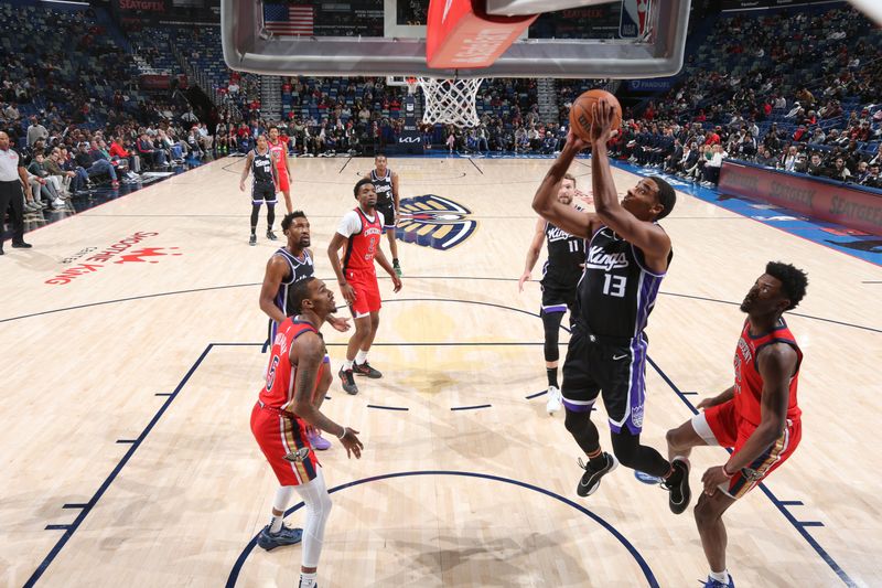 NEW ORLEANS, LA - DECEMBER 12: Keegan Murray #13 of the Sacramento Kings drives to the basket during the game against the New Orleans Pelicans on December 12, 2024 at the Smoothie King Center in New Orleans, Louisiana. NOTE TO USER: User expressly acknowledges and agrees that, by downloading and or using this Photograph, user is consenting to the terms and conditions of the Getty Images License Agreement. Mandatory Copyright Notice: Copyright 2024 NBAE (Photo by Layne Murdoch Jr./NBAE via Getty Images)