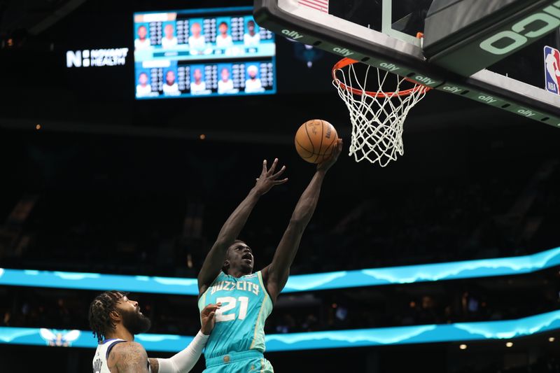 CHARLOTTE, NC - APRIL 9: JT Thor #21 of the Charlotte Hornets shoots the ball during the game against the Dallas Mavericks on April 9, 2024 at Spectrum Center in Charlotte, North Carolina. NOTE TO USER: User expressly acknowledges and agrees that, by downloading and or using this photograph, User is consenting to the terms and conditions of the Getty Images License Agreement. Mandatory Copyright Notice: Copyright 2024 NBAE (Photo by Brock Williams-Smith/NBAE via Getty Images)