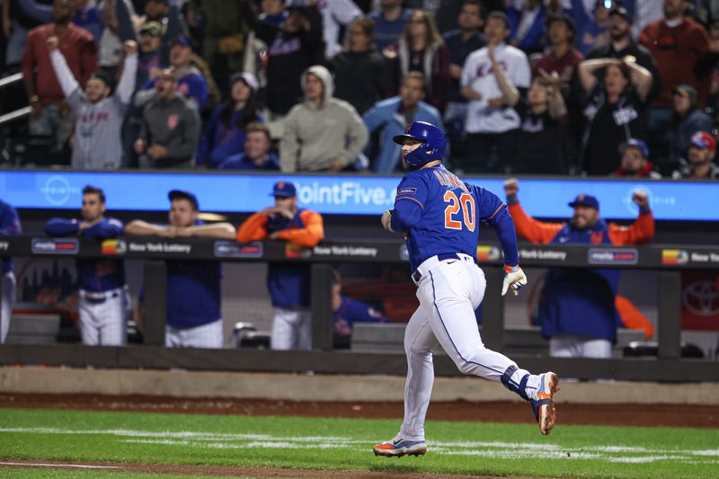 Sep 27, 2023; New York, NY, USA; New York Mets first baseman Pete Alonso (20) doubles during the eighth inning against the Miami Marlins at Citi Field.  Mandatory Credit: Vincent Carchietta-USA TODAY Sports