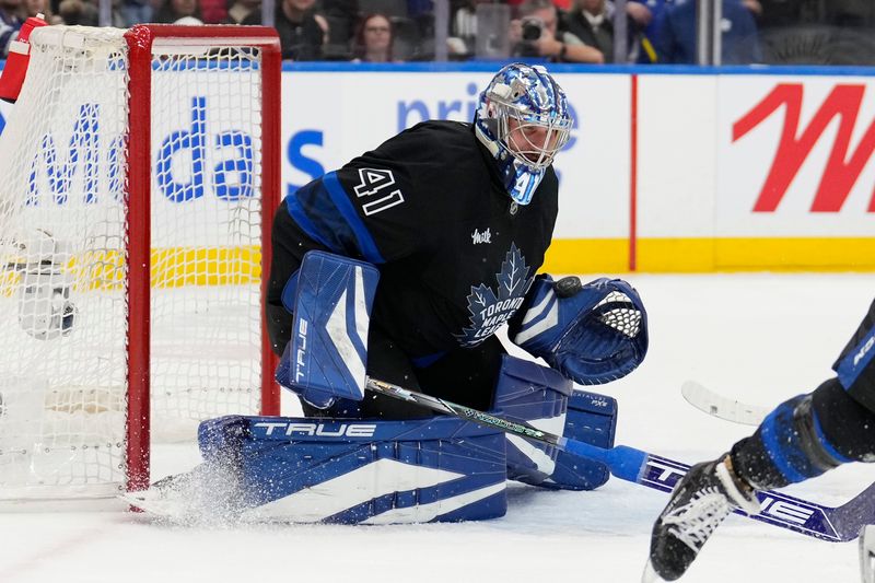 Dec 2, 2024; Toronto, Ontario, CAN; Toronto Maple Leafs goaltender Anthony Stolarz (41) makes a save against the Chicago Blackhawks during the second period at Scotiabank Arena. Mandatory Credit: John E. Sokolowski-Imagn Images