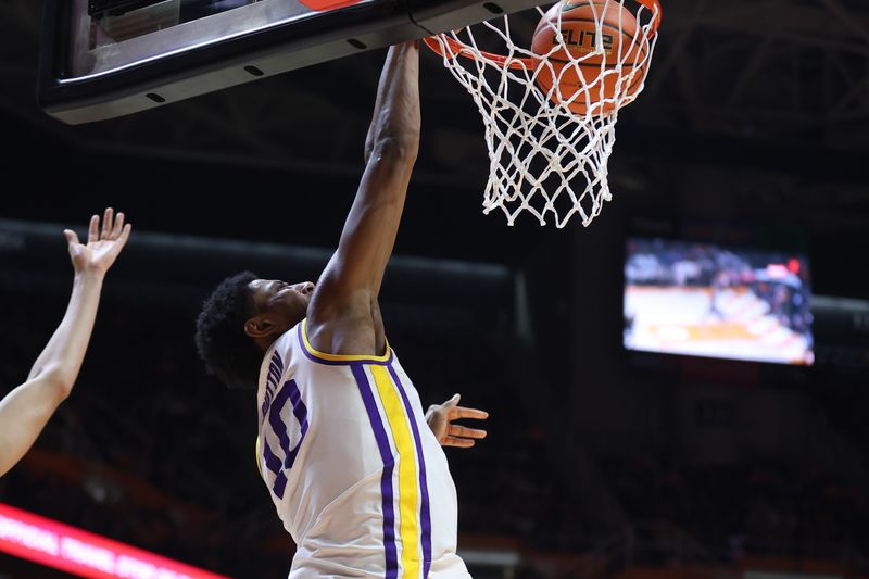 Feb 14, 2026; Knoxville, Tennessee, USA;  Louisiana State Tigers forward Marquel Sutton (10) dunks the ball against the Tennessee Volunteers during the second half at Thompson-Boling Arena at Food City Center. Mandatory Credit: Randy Sartin-Imagn Images