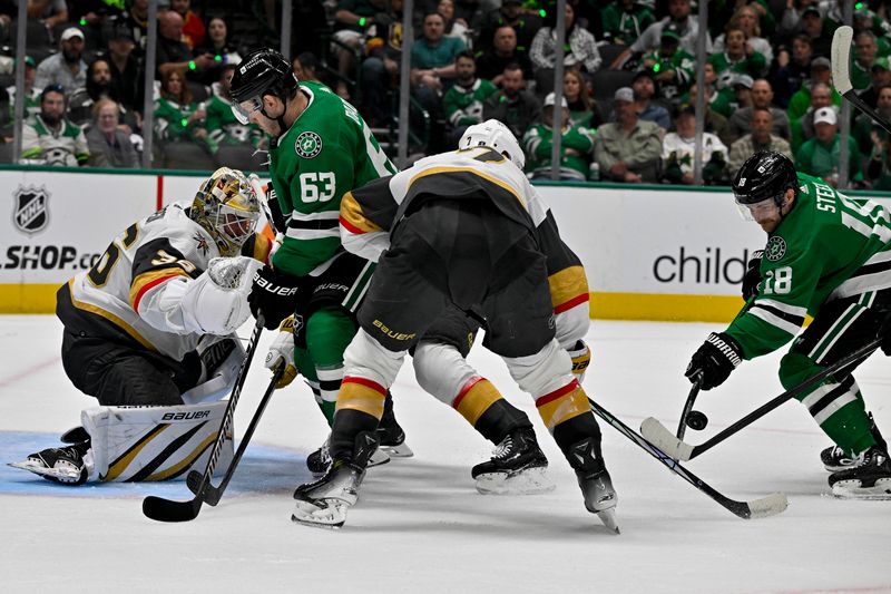 Apr 24, 2024; Dallas, Texas, USA; Vegas Golden Knights goaltender Logan Thompson (36) faces a shot from Dallas Stars right wing Evgenii Dadonov (63) and center Sam Steel (18) during the second period in game two of the first round of the 2024 Stanley Cup Playoffs at American Airlines Center. Mandatory Credit: Jerome Miron-USA TODAY Sports