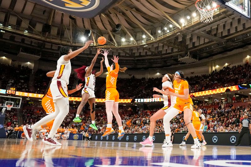 Mar 9, 2024; Greensville, SC, USA;  South Carolina Gamecocks guard Raven Johnson (25) shoots long range defended by Tennessee Lady Vols forward Rickea Jackson (2) during the second half at Bon Secours Wellness Arena. Mandatory Credit: Jim Dedmon-USA TODAY Sports