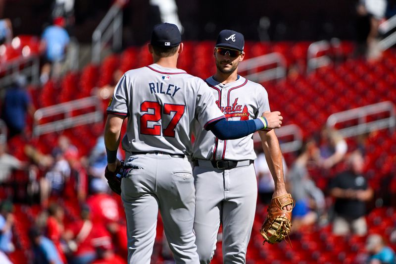 Jun 26, 2024; St. Louis, Missouri, USA;  Atlanta Braves first baseman Matt Olson (28) celebrates with third baseman Austin Riley (27) after the Braves defeated the St. Louis Cardinals at Busch Stadium. Mandatory Credit: Jeff Curry-USA TODAY Sports