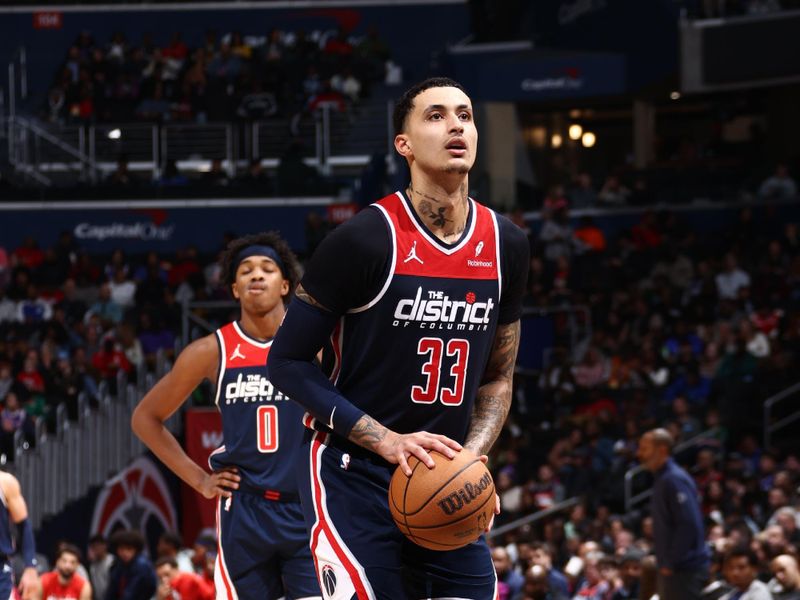 WASHINGTON, DC -? FEBRUARY 10: Kyle Kuzma #33 of the Washington Wizards shoots a free throw during the game against the Philadelphia 76ers on February 10, 2024 at Capital One Arena in Washington, DC. NOTE TO USER: User expressly acknowledges and agrees that, by downloading and or using this Photograph, user is consenting to the terms and conditions of the Getty Images License Agreement. Mandatory Copyright Notice: Copyright 2024 NBAE (Photo by Kenny Giarla/NBAE via Getty Images)