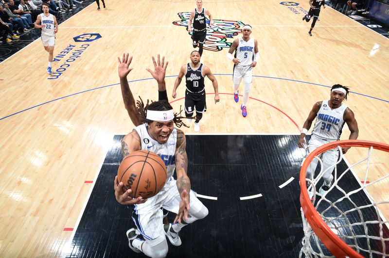 LOS ANGELES, CA - MARCH 18: Markelle Fultz #20 of the Orlando Magic drives to the basket during the game against the LA Clippers on March 18, 2023 at Crypto.Com Arena in Los Angeles, California. NOTE TO USER: User expressly acknowledges and agrees that, by downloading and/or using this Photograph, user is consenting to the terms and conditions of the Getty Images License Agreement. Mandatory Copyright Notice: Copyright 2023 NBAE (Photo by Adam Pantozzi/NBAE via Getty Images)