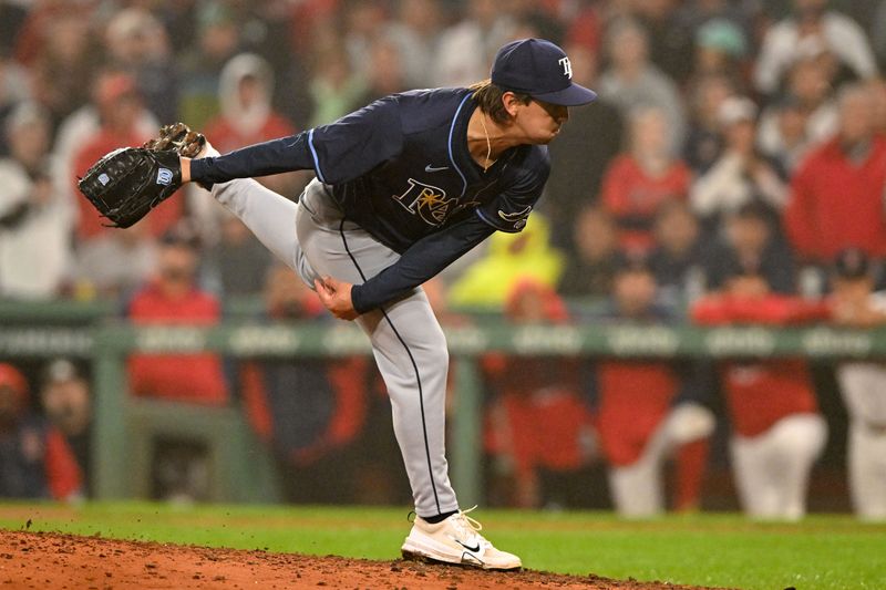 Jun 9, 2025; Boston, Massachusetts, USA; Tampa Bay Rays pitcher Ian Seymour (61) pitches against the Boston Red Sox during the tenth inning at Fenway Park. Mandatory Credit: Brian Fluharty-Imagn Images