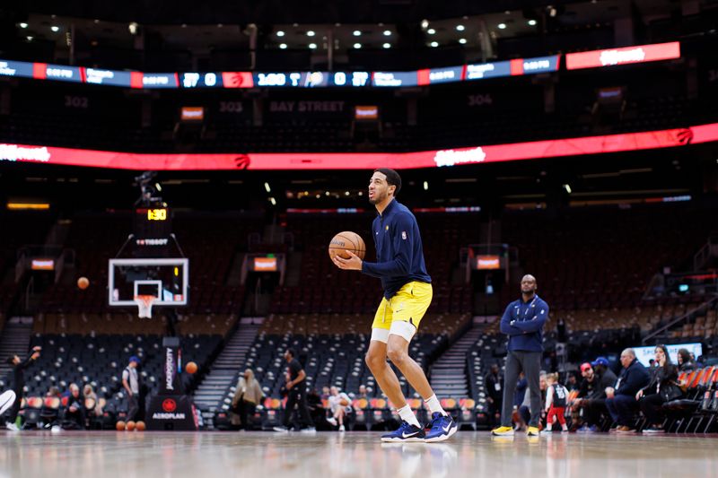 TORONTO, CANADA - APRIL 9: Tyrese Haliburton #0 of the Indiana Pacers warms up ahead of their NBA game against the Toronto Raptors at Scotiabank Arena on April 9, 2024 in Toronto, Canada. NOTE TO USER: User expressly acknowledges and agrees that, by downloading and or using this photograph, User is consenting to the terms and conditions of the Getty Images License Agreement. (Photo by Cole Burston/Getty Images)