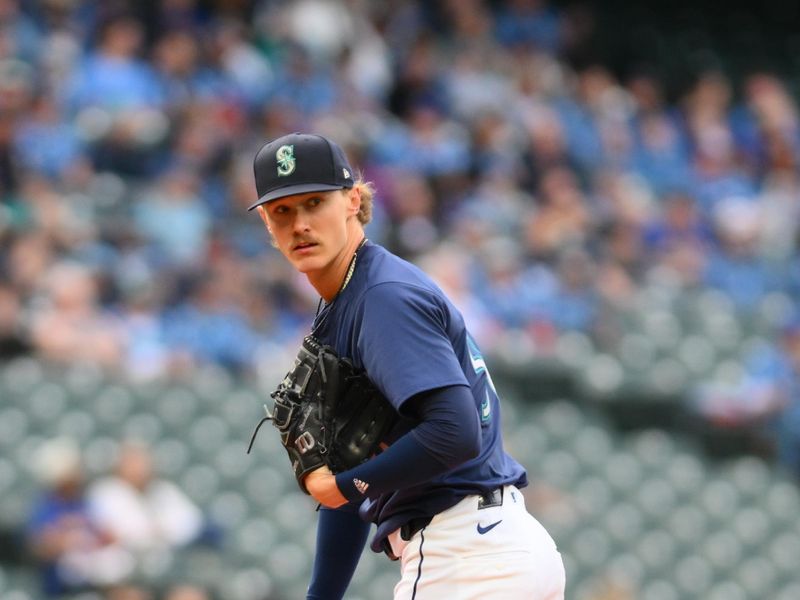 Jun 12, 2024; Seattle, Washington, USA; Seattle Mariners starting pitcher Bryce Miller (50) looks at first base before a pitch against the Chicago White Sox during the first inning at T-Mobile Park. Mandatory Credit: Steven Bisig-USA TODAY Sports